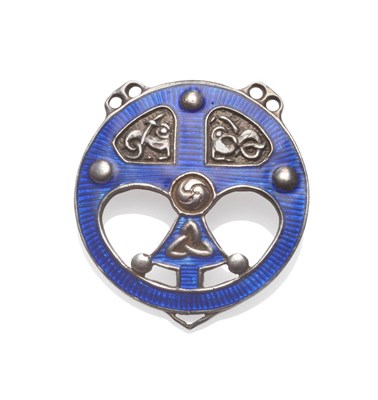 Lot 2138 - A Silver and Enamel Brooch, 1959, with Celtic influences, guilloche enamelled in blue, measures...