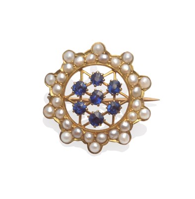 Lot 2163 - A Sapphire and Split Pearl Brooch, in a star formation, the sapphires set over wires creating a...
