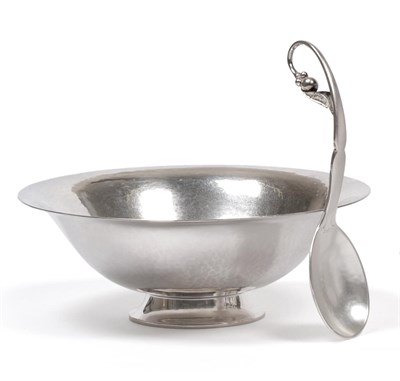 Lot 2218 - A Danish Silver Preserve Bowl and Spoon, Georg Jensen, Denmark, post 1945, the plain circular...