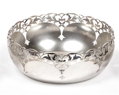 Lot 2237 - A George V Pierced Silver Bowl, Mappin & Webb, Sheffield 1929, circular with a shaped rim and...