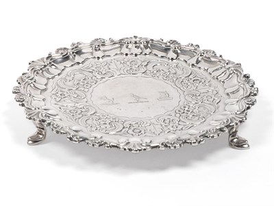 Lot 2249 - A William IV Irish Silver Waiter, James Fray, Dublin 1835, rococo revival with a cast rocaille...