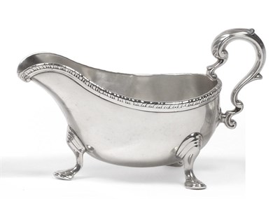 Lot 2253 - A George II Silver Sauce Boat, Magdalen Feline, London circa 1757, of typical form with a gadrooned