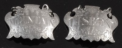 Lot 2324 - A Pair of George II Silver Escutcheon Wine Label, Edmund Medleycott, maker's mark only circa...