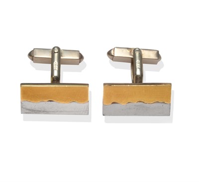 Lot 2009 - A Pair of 18 Carat Two Colour Gold Cufflinks, the oblong heads in white polished gold, with a...