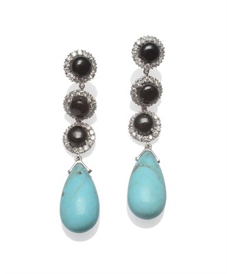 Lot 2010 - A Pair of 18 Carat White Gold Onyx, Diamond and Turquoise Drop Earrings, each comprising three...