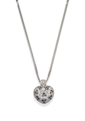 Lot 2011 - An 18 Carat White Gold Sapphire and Diamond Pendant, the heart shaped pendant pavé  set with round