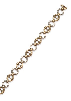 Lot 2025 - A 9 Carat Gold Bracelet, two colour fancy links, length 19.3cm
