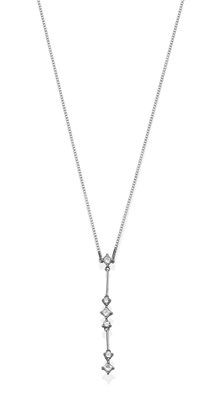 Lot 2035 - An 18 Carat White Gold and Diamond Necklace, the articulated drop set with round brilliant and...