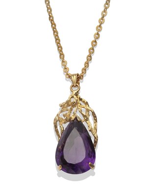Lot 2050 - An Amethyst Pendant on Chain, a pear cut amethyst in a yellow three claw setting with a...