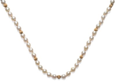 Lot 2053 - A Baroque Pearl Necklace, a row of baroque pearls with segmented beads at intervals, length 49cm