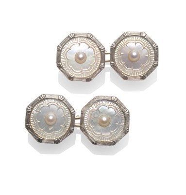 Lot 2060 - A Pair of Mother-of-Pearl Cufflinks, each head comprises a split pearl to the centre of an engraved