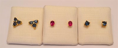 Lot 2063 - Three Pairs of Gemstone Earrings, including; a pair of oval cut ruby studs, a pair of round...