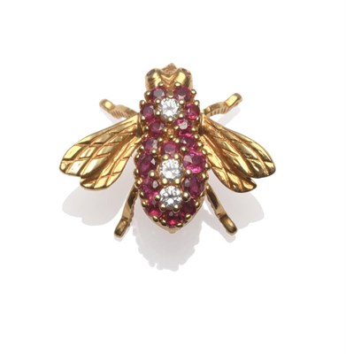 Lot 2075 - A Bee Brooch, by Tiffany & Co., the bee modelled in yellow and inset to the body with rubies...