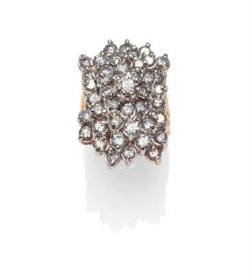 Lot 2080 - A Diamond Cluster Ring, the spray form set throughout with round brilliant cut diamonds, in...