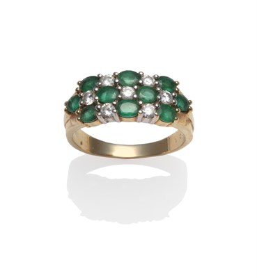 Lot 2081 - An Emerald and Diamond Ring, three rows of alternating oval cut emeralds and round brilliant...