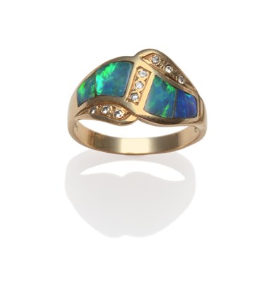 Lot 2090 - An Opal Triplet Set Ring, the ring in a cross-over style, inlaid with opal triplets, with...