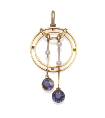 Lot 2104 - An Early 20th Century Sapphire and Seed Pearl Pendant, the hoop shape with pearl set wires and...