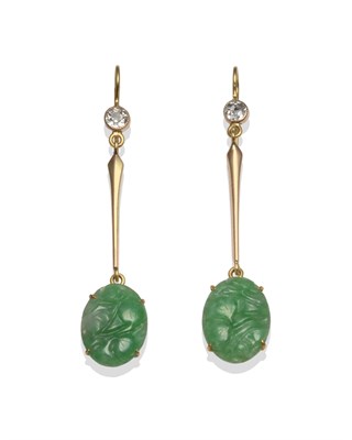 Lot 2109 - A Pair of Diamond and Jade Drop Earrings, circa 1920, an old cut diamond in a collet setting...