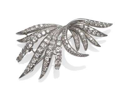 Lot 2117 - A Diamond Brooch, the spray form set with round brilliant cut and eight-cut diamonds in white...