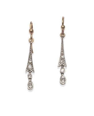 Lot 2119 - A Pair of Diamond Drop Earrings, circa 1920, of tapered form with double drop suspended from...