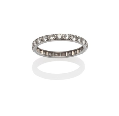 Lot 2122 - A Diamond Eternity Ring, the round brilliant cut diamonds in white claw settings, total...