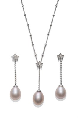 Lot 2127 - A Pair of 18 Carat White Gold Diamond and Cultured Pearl Drop Earrings, a diamond set star suspends