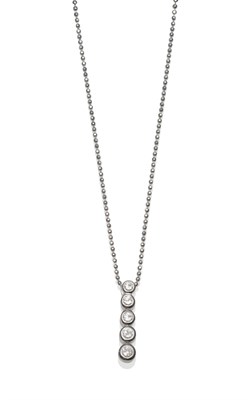 Lot 2142 - An 18 Carat White Gold Diamond Drop Pendant on Chain, five graduated round brilliant cut...