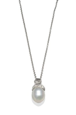 Lot 2143 - A Cultured Pearl and Diamond Pendant on Chain, the cultured pearl surmounted by a diamond set swirl