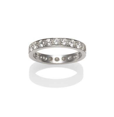 Lot 2156 - A Diamond Full Eternity Ring, round brilliant cut diamonds in white claws to a flat sided...