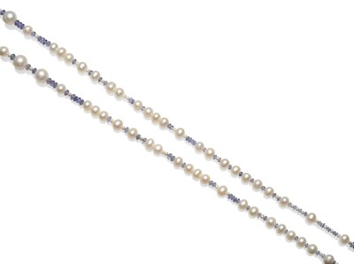 Lot 2175 - A Tanzanite and Cultured Pearl Necklace, faceted tanzanite beads strung with various sized cultured