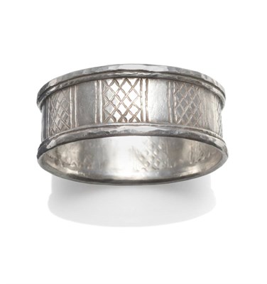 Lot 2177 - A Contemporary Bangle, by Guy Royle, with crosshatch design