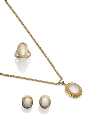 Lot 2181 - A Suite of Opal Jewellery, including; an opal pendant on chain, the opal in a rope twist border...