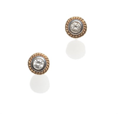 Lot 2186 - A Pair of 9 Carat Gold Diamond Solitaire Earrings, the round brilliant cut diamonds in a white...