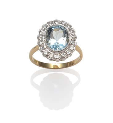 Lot 2195 - An Aquamarine and Diamond Cluster Ring, the oval cut aquamarine within a border of eight-cut...