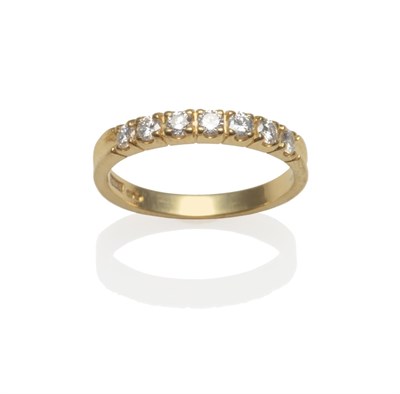 Lot 2207 - An 18 Carat Gold Diamond Seven Stone Ring, the round brilliant cut diamonds in claw settings,...