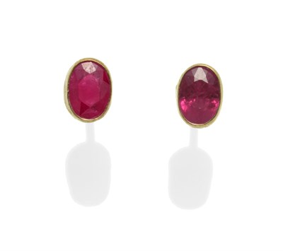 Lot 2213 - A Pair of 9 Carat Gold Ruby Earrings, the oval cut rubies in yellow collet settings, with post...