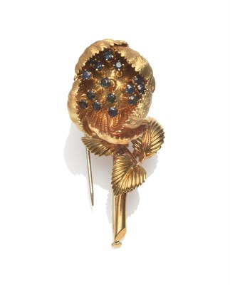 Lot 2219 - A Floral Brooch, en tremblant, with sapphires on stalks to the centre of the stylised flower...