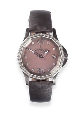 Lot 2272 - A Lady's Stainless Steel and Diamond Set Automatic Calendar Wristwatch, signed Corum, model:...