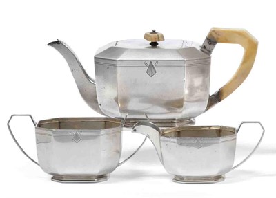 Lot 2307 - An Art Deco Silver Tea Service, Viner's Ltd, Sheffield 1938, comprising teapot, sugar bowl and milk