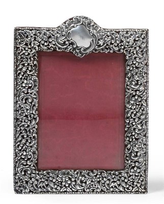 Lot 2310 - A Victorian Silver Photograph Frame, Deakin & Francis Ltd, Birmingham 1900, the frame pierced...