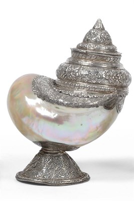 Lot 2324 - An Indian Silver Mounted Turbo Marmoratus Shell, the iridescent shell with a hinged cover and...