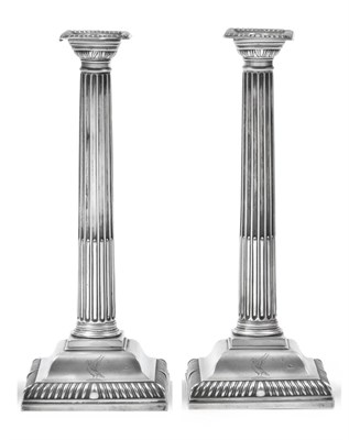 Lot 2328 - A Pair of George III Corinthian Column Silver Candlesticks, James Stamp & John Baker, London...