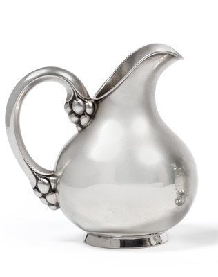 Lot 2361 - A Swiss Sterling Silver Jug, Meister Silber, the bulbous body with a plain loop handle with...