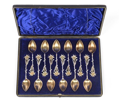 Lot 2386 - A Cased Set of Twelve Edwardian Frosted Silver Teaspoons, James Dixon & Sons Ltd, Sheffield...