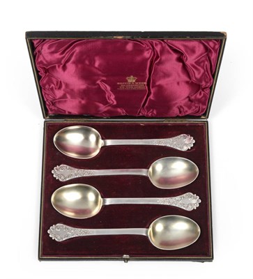 Lot 2387 - A Set of Four Victorian Lace Back Trefid Spoons, Mappin & Webb, Sheffield, three 1894 one 1895,...