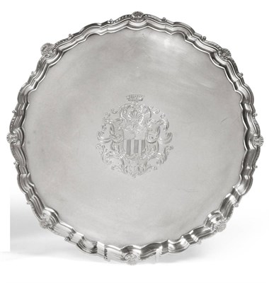 Lot 2389 - A George II Silver Salver, John Swift, London 1737, the shaped circular border punctuated with...