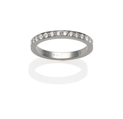 Lot 2003 - A Platinum Diamond Half Hoop Ring, round brilliant cut diamonds in white claw settings, to a...