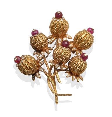 Lot 2024 - A Ruby and Diamond Flower Brooch, the six textured yellow flower heads inset with round...