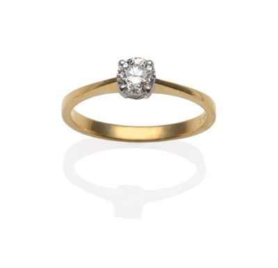 Lot 2041 - An 18 Carat Gold Diamond Solitaire Ring, the round brilliant cut diamond in a white claw...