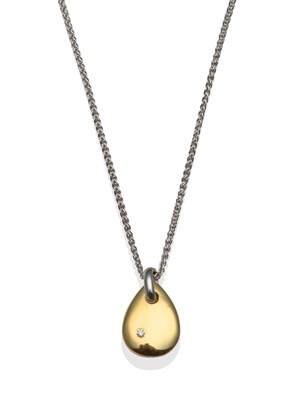 Lot 2050 - An 18 Carat Gold Diamond Set Pendant on Chain, the polished drop-shaped yellow pendant inset with a